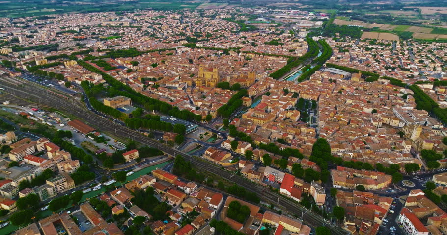 Aerial view the beautiful historic city of Montpellier in southern France, known for its architecture, charming streets, the Place de la Comedie, its old town center, and its Mediterranean atmosphere