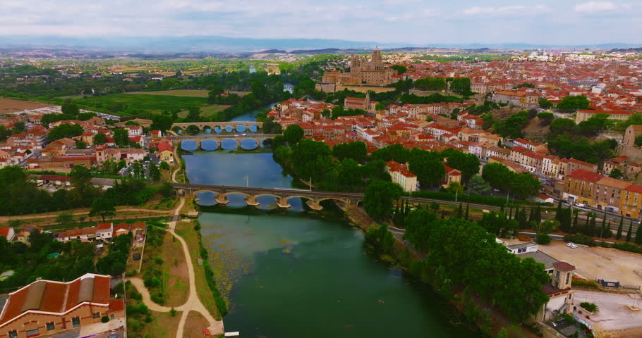 Aerial view of Beziers, charming historic city in southern France, known for the Cathedral of Saint Nazaire, the Canal du Midi, picturesque streets, traditional French architecture