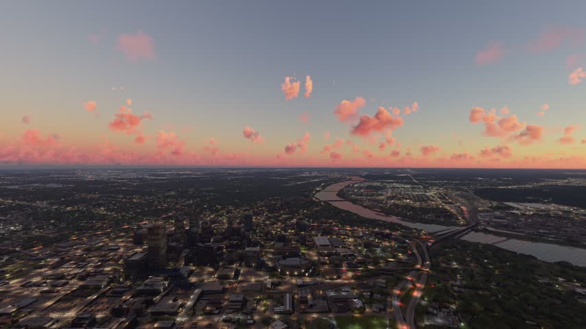 3D - Circular aerial shot at sunset of Tulsa city and the Arkansas River. Oklahoma. United States