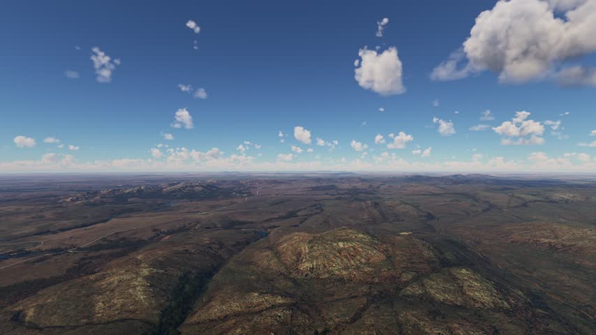 3D - Side aerial shot of Wichita Mountains Wildlife Refuge with granite peaks and lakes. Oklahoma. United States