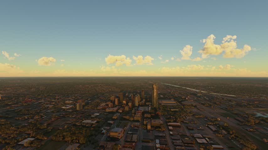 3D - Circular aerial drone shot at sunset of Oklahoma City and the Oklahoma River. Oklahoma. United States