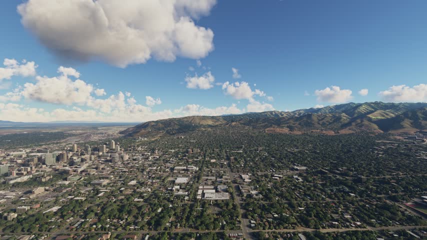 3D - Side aerial view of Salt Lake City and the Wasatch Mountains. Utah. United States