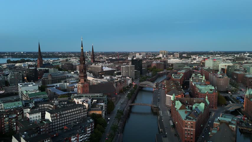 Aerial view of the historic Speicherstadt warehouse district with its iconic brick buildings, canals, and bridges in the city of Hamburg, Hamburg, Germany.