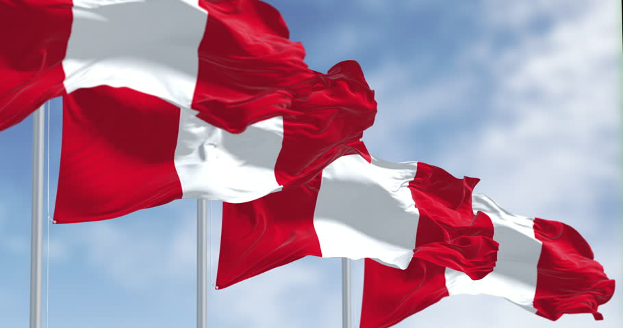 Close-up view of Peru national flags waving in the wind. The Republic of Peru is a country in western South America. Seamless 3d render animation. Slow motion loop. Selective focus