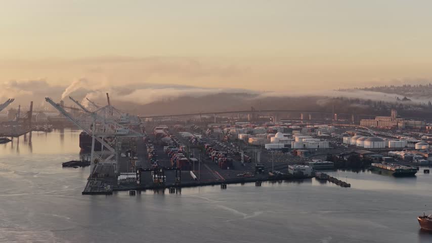 Shipyard cranes, cargo containers and vessels at a busy port, Seattle, USA. g2.