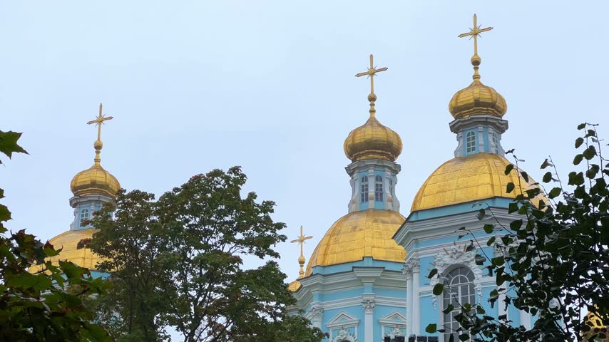 RUSSIA - September 20, 2025: Nicholas Epiphany Naval Cathedral is an Orthodox church in the Admiralteisky district of Saint Petersburg. Historical and ornate architecture. Golden domes. 4К