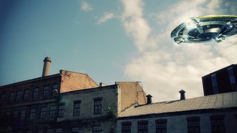 Flying saucer scouts over abandoned factory.