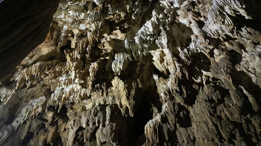 Limestone Cave Interior with Stalactites and Stalagmites