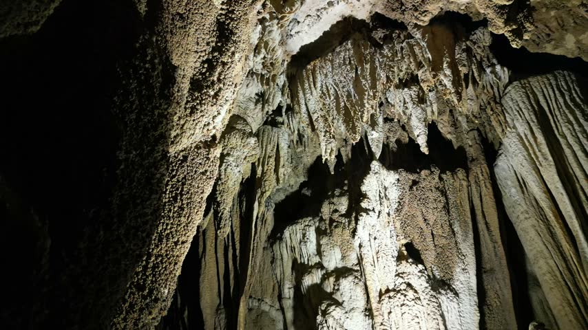 Limestone Cave Interior with Stalactites and Stalagmites