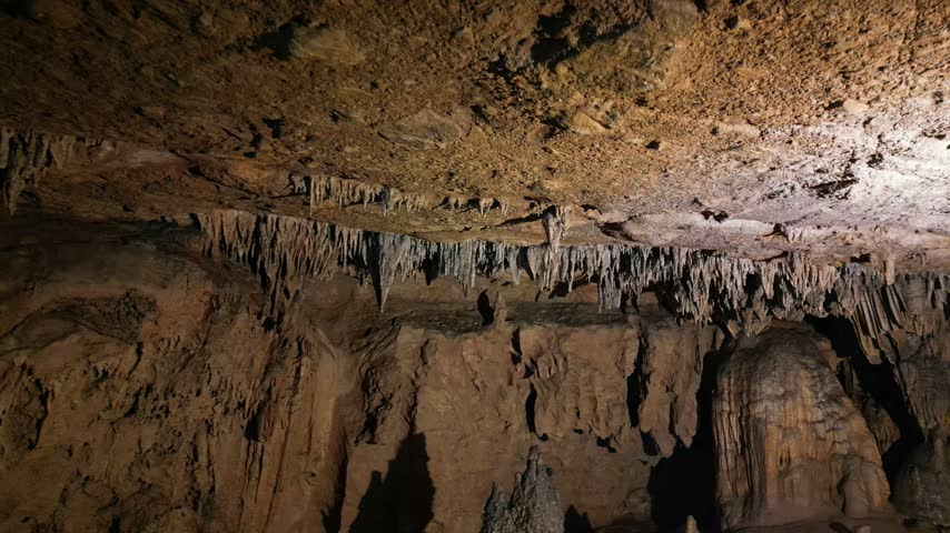 Limestone cave with stalactites and rocky formations