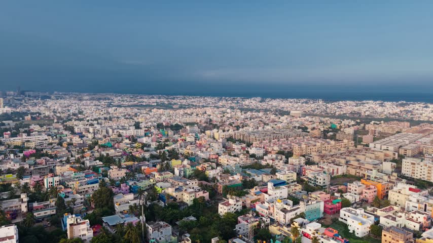 Aerial view of the dense urban landscape and residential buildings in the coastal city of Chennai, Tamil Nadu, India.