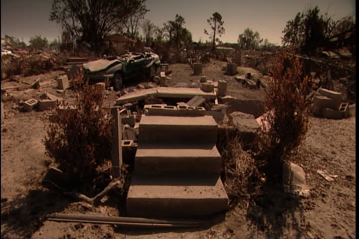 Flight of stairs to nowhere sits in lot filled with debris in New Orleans after Hurricane Katrina (October 2005)