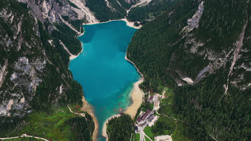 Aerial View Of Pragser Wildsee (Lake Prags) Surrounded By Densely Forested Slopes In Italy.
