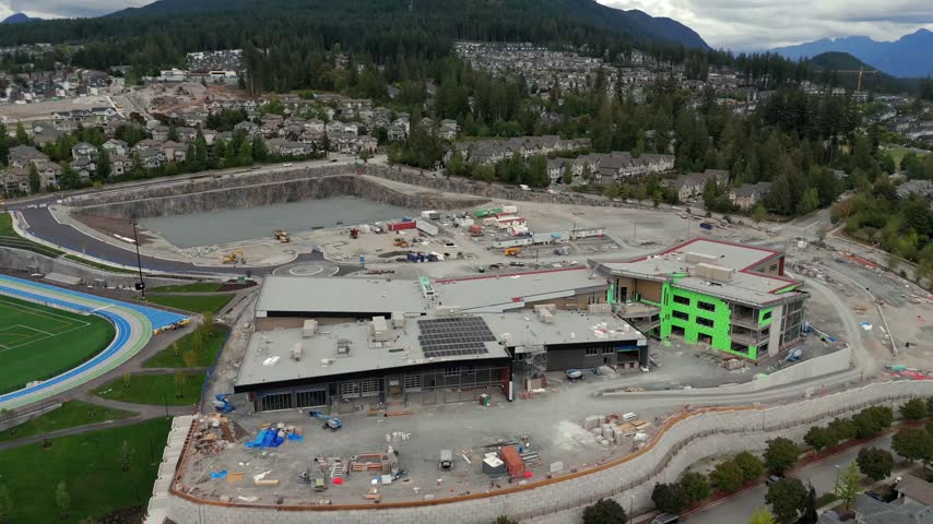 Burke Mountain Middle and Secondary School and Athletic Park Are Under Construction In Coquitlam, British Columbia, Canada. Aerial Drone Shot