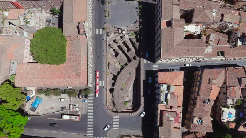 The Roman Amphitheatre of Catania (Anfiteatro Romano di Catania) is an ancient 2nd-century Imperial Roman arena located in Piazza Stesicoro. Built primarily from dark volcanic basalt from Mount Etna.