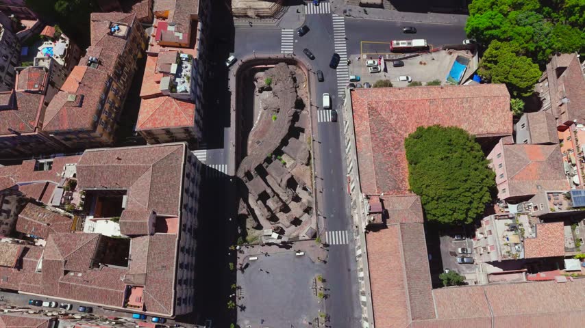 The Roman Amphitheatre of Catania (Anfiteatro Romano di Catania) is an ancient 2nd-century Imperial Roman arena located in Piazza Stesicoro. Built primarily from dark volcanic basalt from Mount Etna.