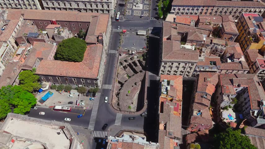 The Roman Amphitheatre of Catania (Anfiteatro Romano di Catania) is an ancient 2nd-century Imperial Roman arena located in Piazza Stesicoro. Built primarily from dark volcanic basalt from Mount Etna.
