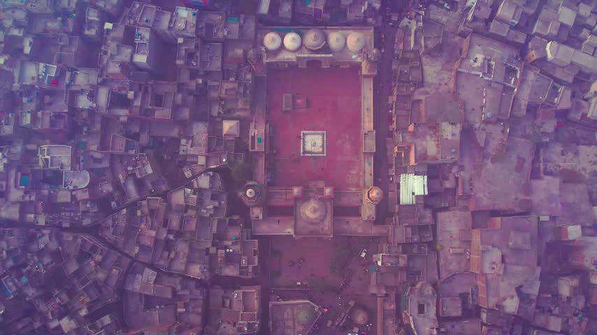 Top-down aerial drone view of Wazir Khan Mosque at the center of Lahore