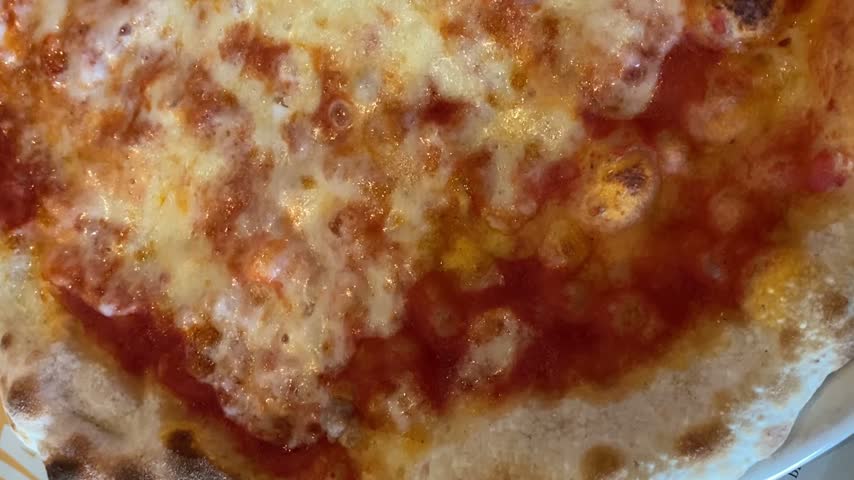 Close up view of fresh baked traditional italian margherita pizza.