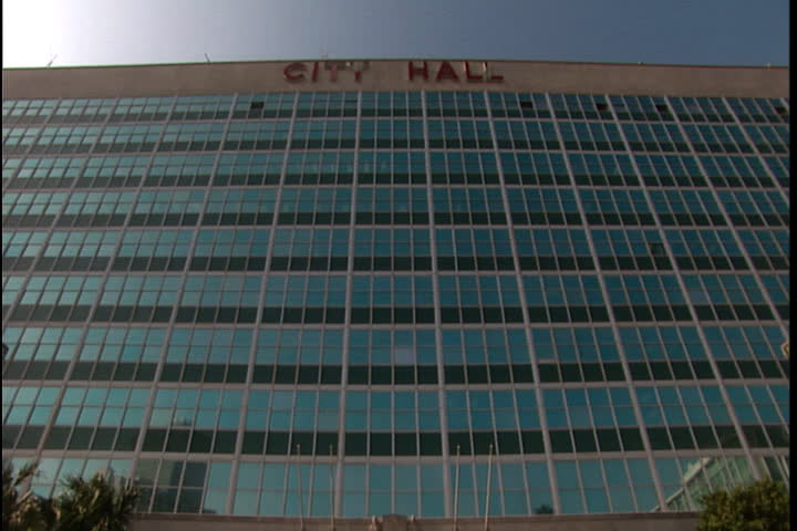 Tilt down front of New Orleans city hall building, mostly unscathed after Katrina (October 2005).