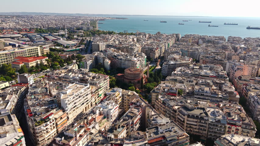 Drone View of Thessaloniki Greece City Center, Rotonda and Residential Buildings, Aegean Sea