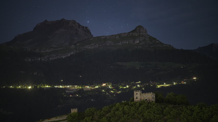 At Château Ravire in Switzerland, the stars move across the mountains at night.