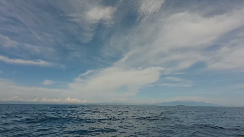 Vast Ocean View Under a Cloudy Sky