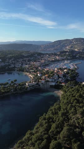 Beautiful French Riviera coastline in the south of France, featuring Antibes and Saint-Jean-Cap-Ferrat, with turquoise Mediterranean waters, luxury villas, rocky coastlines, beaches and stunning summer scenery.
