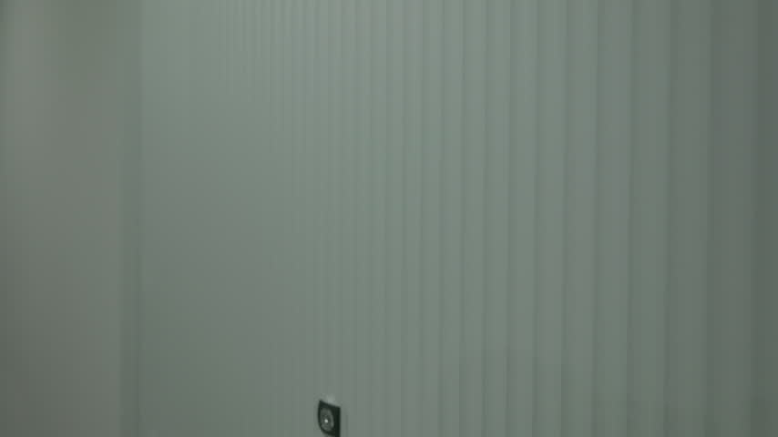 Close up of textured apartment entrance door in residential corridor