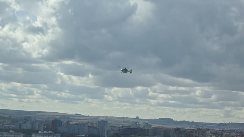 Helicopter flying over Burgos, Spain.