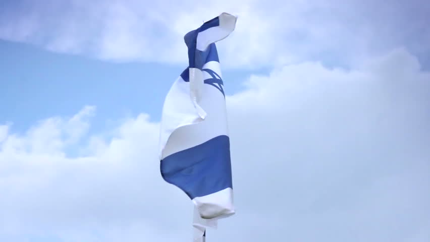 Israeli national flag waving on flagpole. Israel, Palestine