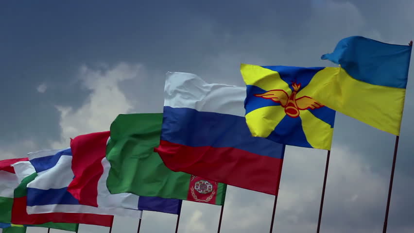 Many countries flags on flagpoles. Ukrainian, Russian, Turkmen. Union, politics
