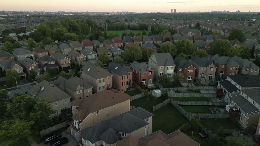 Socker-Football Field in Suburban area during sunset - Drone POV - Right to Left motion - Richmond Hill 