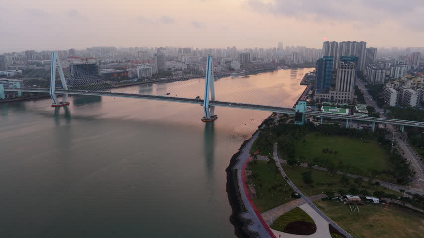 Haikou city skyline sunrise aerial view near Century Bridge, Hainan, China