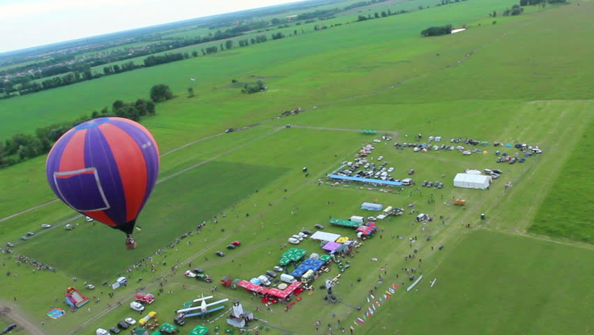 Aerial view of air show zone, balloon and horizon. Passenger pov