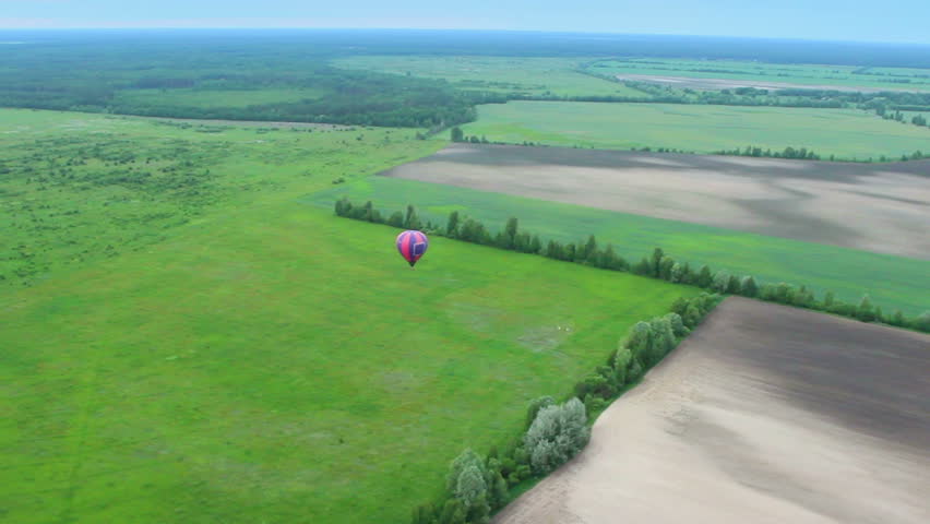 Beautiful aerial landscape view shot, blue horizon, suburb, air balloon pov