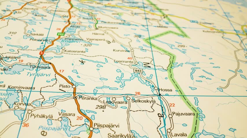 Gliding view over the Finland–Russia border to Kuusamo – sliding camera movement across a printed map