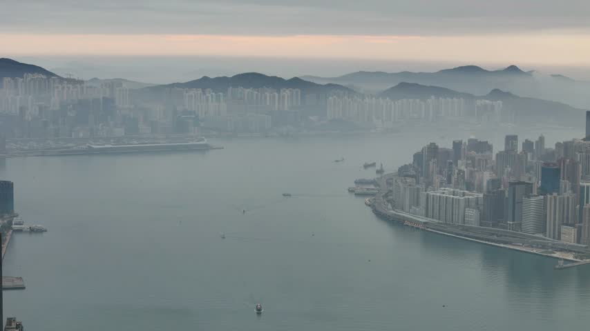 Minimal foggy cityscape: calm water, hazy hills and a dense island waterfront in pale morning light, a quiet Hong Kong background with room for titles and copy.