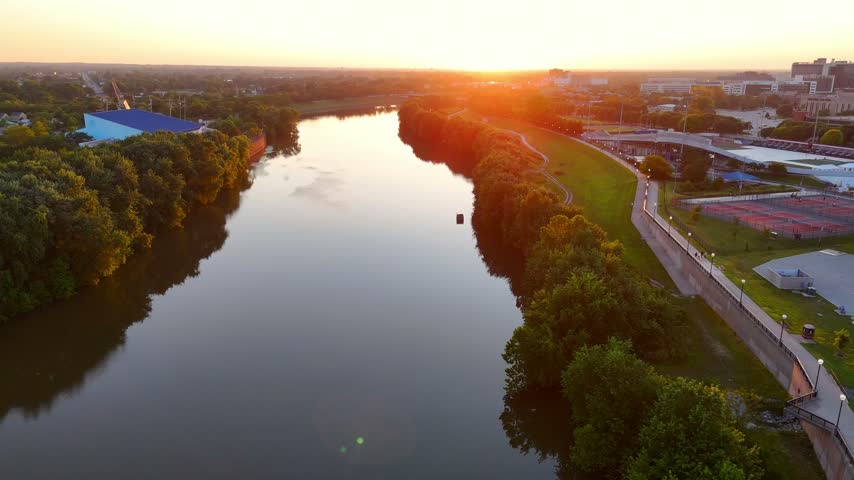 Aerial view of Indianapolis, Indiana, showing the White River and the city at sunset