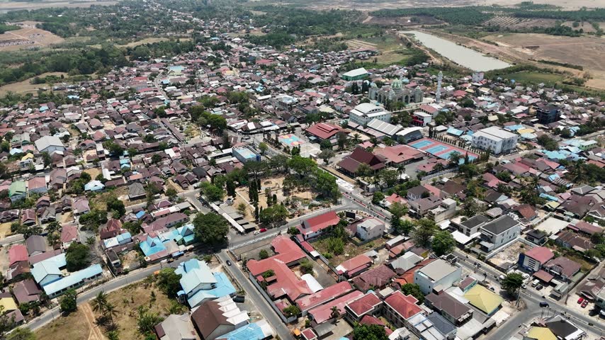 Aerial view of a town in South Kalimantan Indonesia featuring houses and local infrastructure