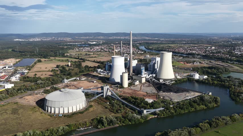Aerial view of powerplant Staudinger on the Main River in Hesse, Germany, a conventional power plant site transitioning from coal and gas toward hydrogen-ready energy generation.