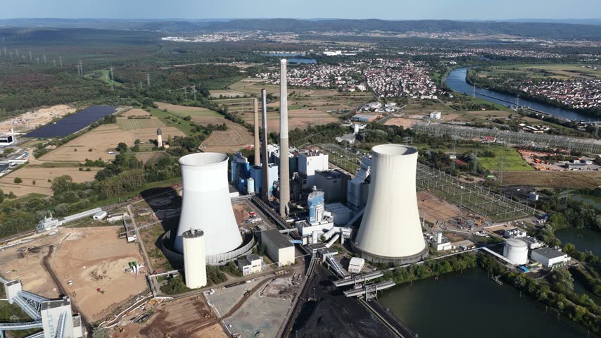 Aerial view of powerplant Staudinger on the Main River in Hesse, Germany, a conventional power plant site transitioning from coal and gas toward hydrogen-ready energy generation.