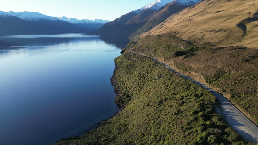 New Zealand aerial view of Lake Hawea showcases breathtaking Southern Alps scenery with beautiful mountain ranges and tranquil natural landscapes for travel and tourism 