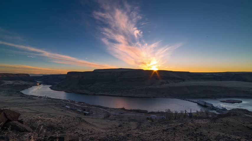 Sunset timelapse capturing fading light over rural Idaho canyon and river