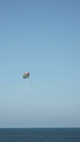 Parasailing Above the Mediterranean Sea Along Alicante Coast, Spain