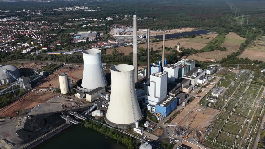 Aerial view of powerplant Staudinger on the Main River in Hesse, Germany, a conventional power plant site transitioning from coal and gas toward hydrogen-ready energy generation.