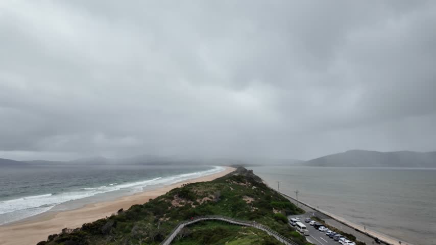The Neck isthmus on Bruny Island seen from the lookout under stormy sky Tasmania.
