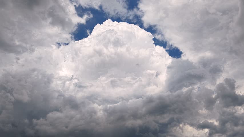 Dark heavy storm clouds above dense green forest canopy Appalachian Mountain range Canada