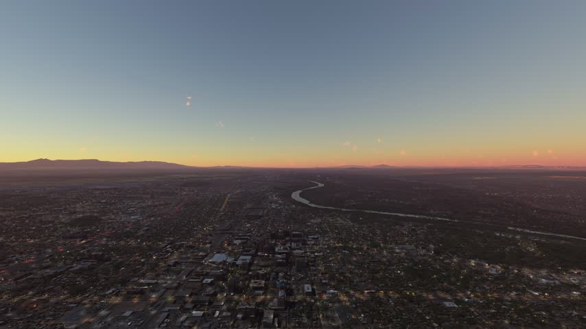 3D - Circular aerial view at sunrise of Albuquerque city and the Rio Grande. New Mexico. United States