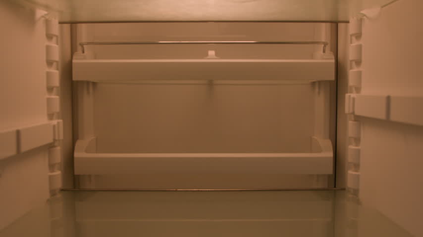 Hungry Caucasian man ordering online food delivery with smartphone look inside empty fridge POV in kitchen sad disappointed male using mobile webstore app grocery shopping supermarket service order